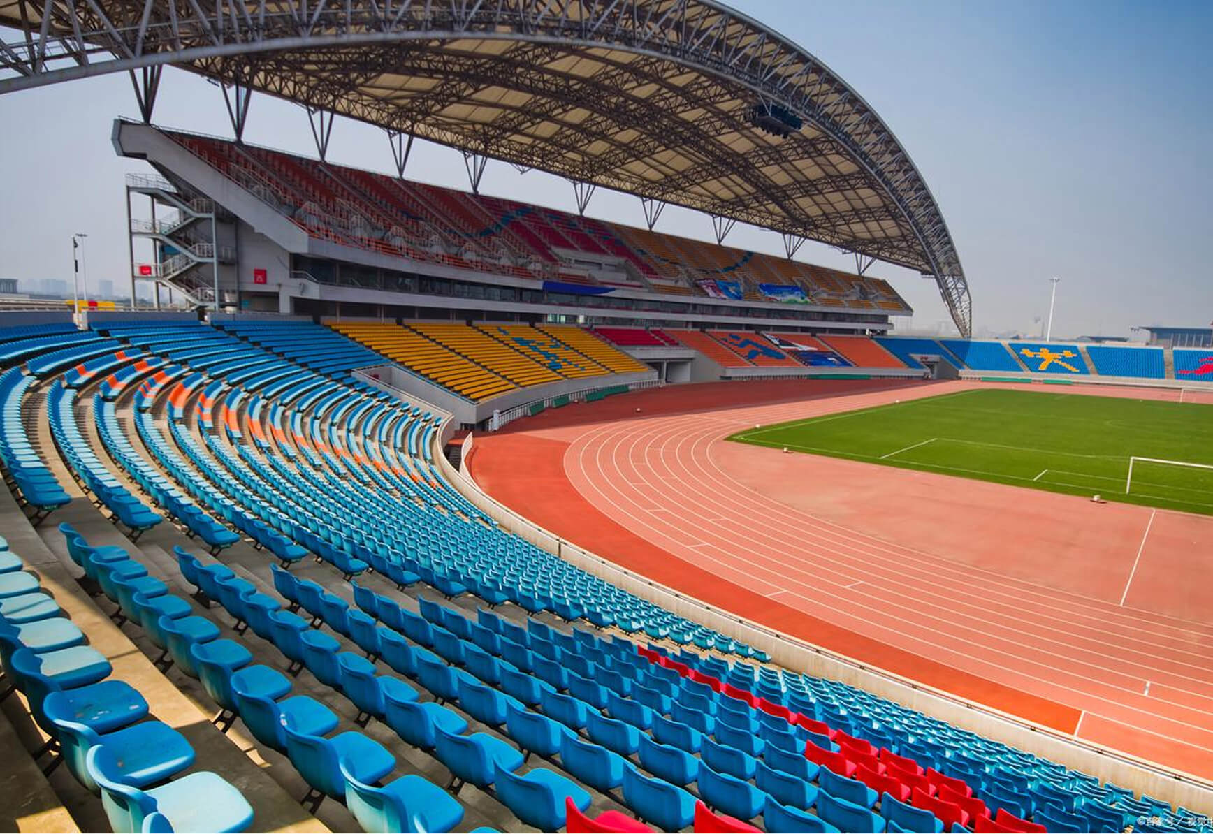 Professional Silicon PU sports venue flooring installation by ZTR SPORT