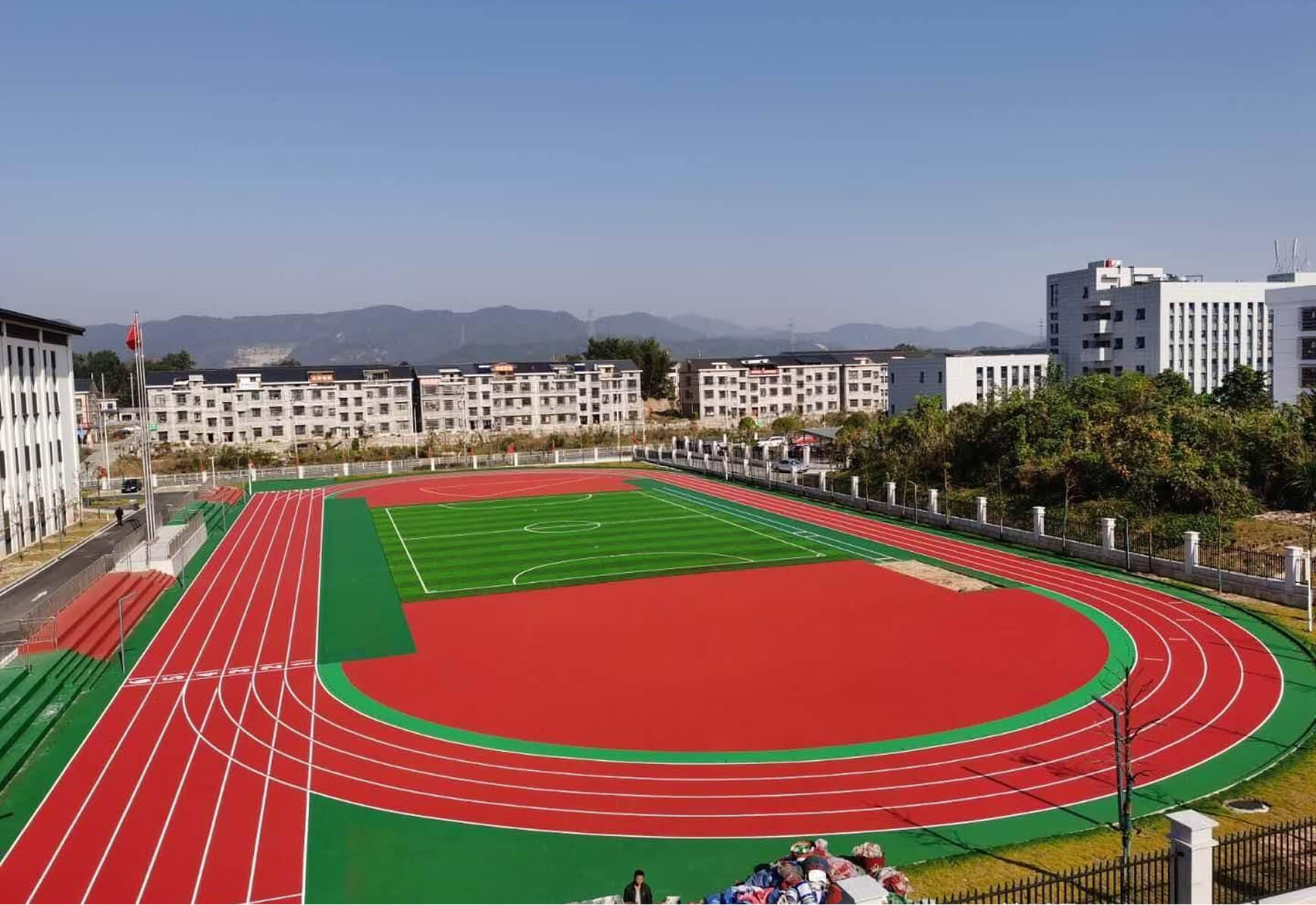 Durable artificial turf installation for sports fields